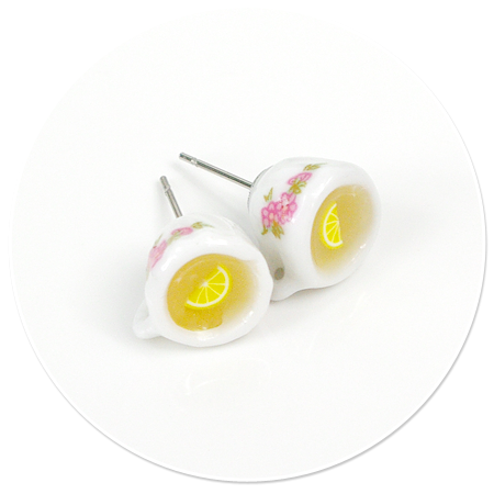 plug-in earrings with cup of tea
