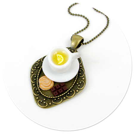 necklace tray with tea and sweets